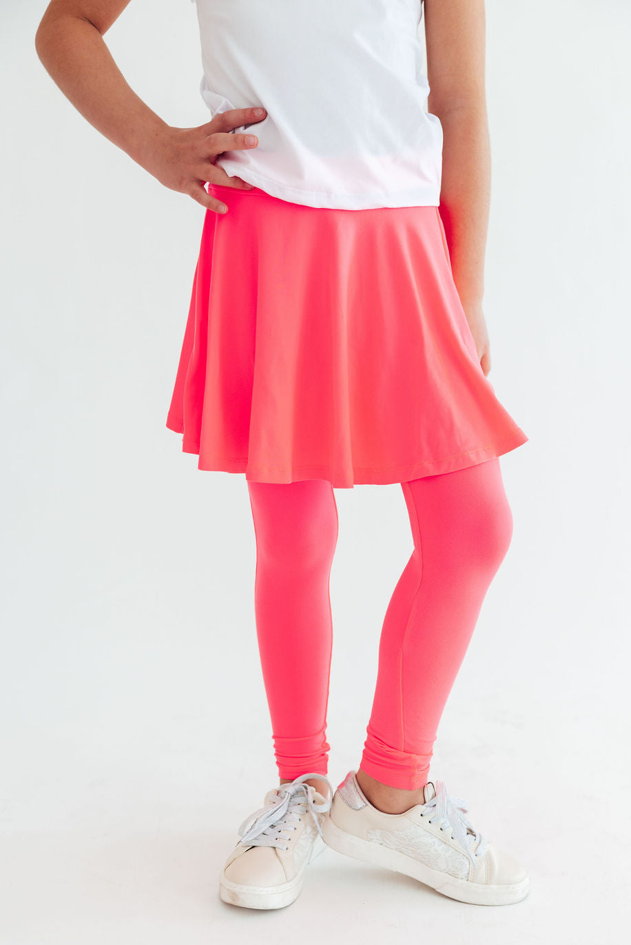 Neon pink twirl Mila & Rose skegging featuring a vibrant, stretchy fabric and fitted design for activewear or casual outfits.