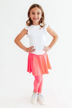 Neon pink twirl Mila & Rose ® skegging shown, fitted stretch leggings with vibrant pink and swirling pattern.