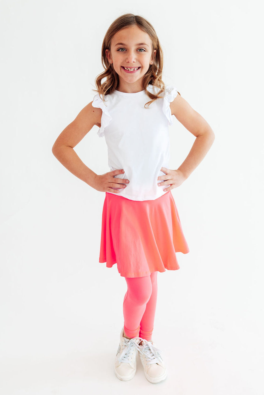 Neon pink twirl Mila & Rose ® skegging shown, fitted stretch leggings with vibrant pink and swirling pattern.