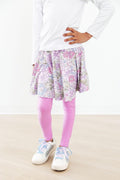 Mila & Rose Spring Gardens Twirl Skegging in vibrant floral pattern, soft stretchy fabric, close-up of the colorful design and fit.