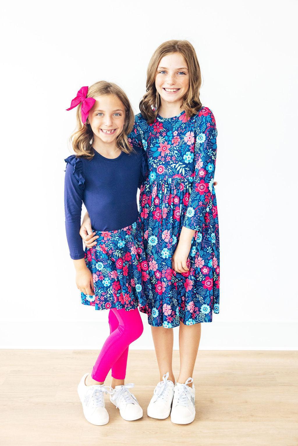 Mila & Rose Sweet Gardenia Twirl Skegging in pastel pink with floral pattern, close-up of soft stretchy fabric and comfortable fit.