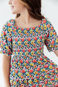 Mila & Rose® beautiful blossoms smocked ruffle dress for girls, featuring floral print, ruffled sleeves, and smocked bodice.