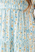 2T Mila & Rose Buttercup Blooms smocked ruffle dress with floral pattern, featuring ruffle details and smocked bodice.