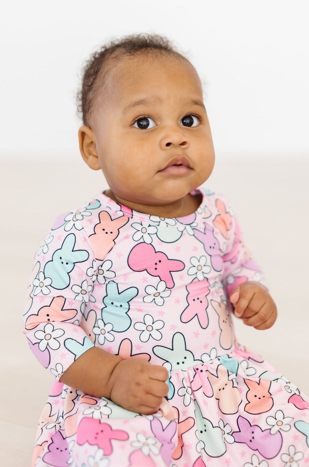 Mila & Rose twirl bodysuit for infants with 3/4 sleeves, featuring a playful "Hangin with My Peeps" design in soft fabric.