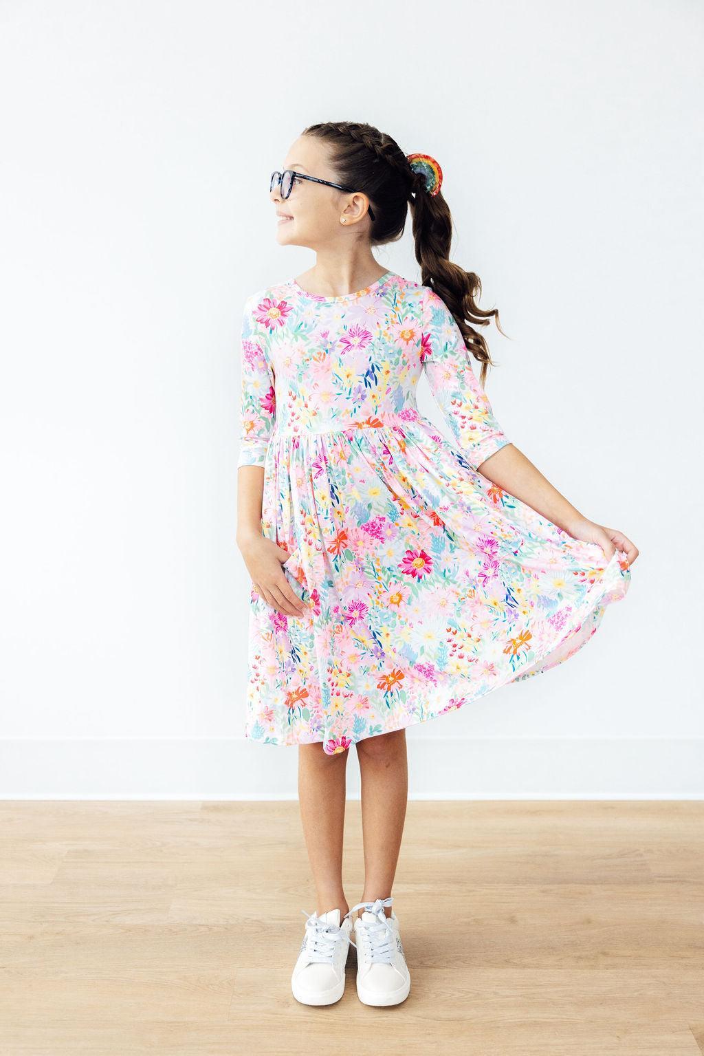Mila & Rose Field of Flowers 3/4 Sleeve Pocket Twirl Dress for babies, featuring a floral pattern and comfortable design.