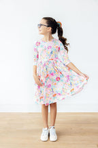 Mila & Rose Field of Flowers 3/4 Sleeve Pocket Twirl Dress for babies, featuring a floral pattern and comfortable design.