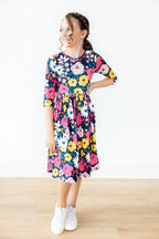 Mila & Rose midnight floral 3/4 sleeve pocket twirl dress for girls, featuring a twirl skirt and floral print.