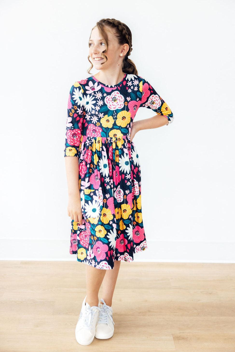 Mila & Rose midnight floral 3/4 sleeve pocket twirl dress for girls, featuring a twirl skirt and floral print.
