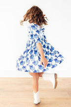Mila & Rose Lone Star 3/4 Sleeve Ruffle Twirl Dress for infants, featuring ruffle details and a playful twirl design.