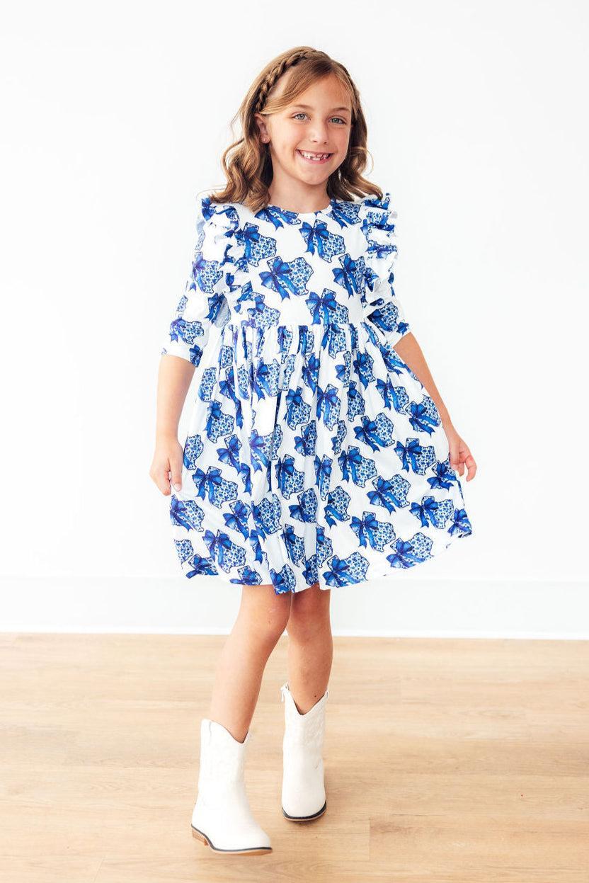 Mila & Rose® Lone Star 3/4 Sleeve Ruffle Twirl Dress for toddlers, pink with ruffle details and playful twirl design.