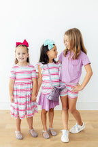 Mila & Rose pastel stripes twirl shorts for toddlers, featuring colorful, lightweight fabric perfect for warm weather.