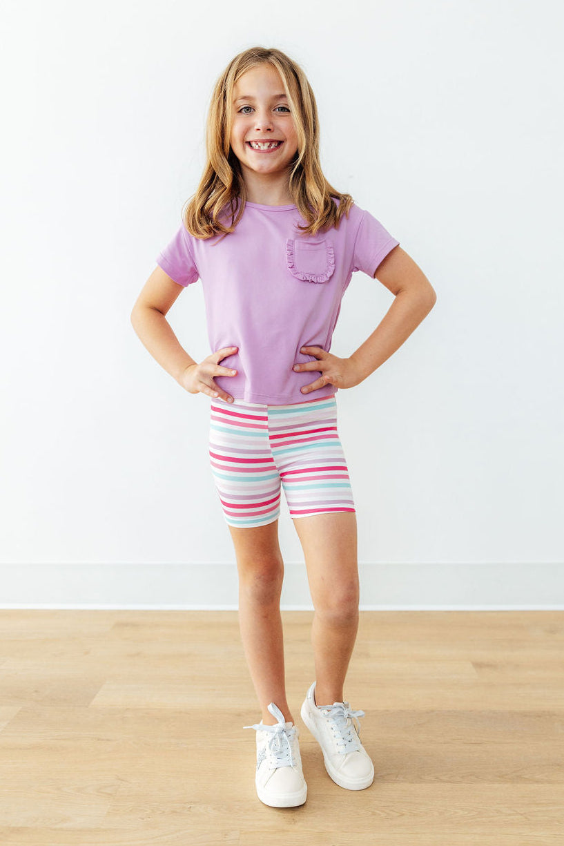 Mila & Rose pastel stripes twirl shorts for toddlers, featuring colorful fabric and comfortable elastic waistband.