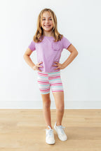 Mila & Rose pastel stripes twirl shorts for toddlers, featuring colorful fabric and comfortable elastic waistband.