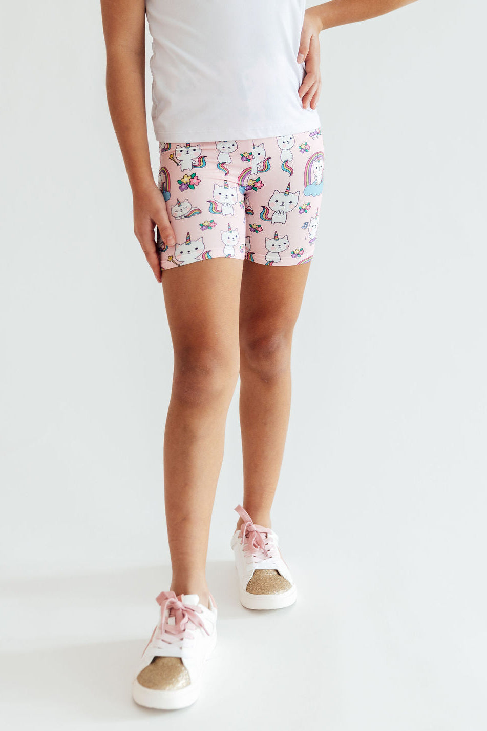 Baby girl wearing Mila & Rose Rainbow Purr-fection Twirl Shorts in size 12-24 months, featuring colorful rainbow design and playful twirl style.