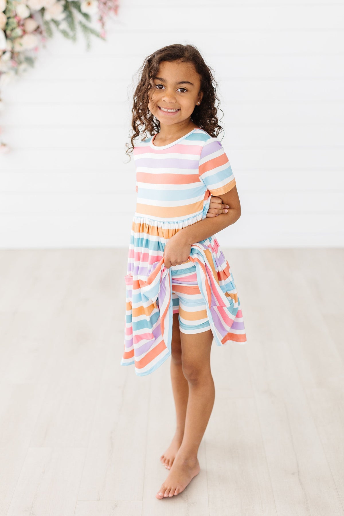 Mila & Rose® Spring Stripes Twirl Shorts for toddlers, pink and white striped fabric, playful design with a twirl skirt style.