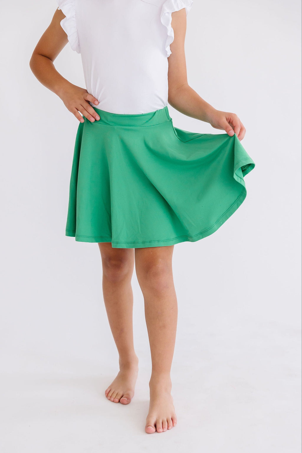 Kelly green Mila & Rose twirl skort for toddlers, featuring a playful, flared design with a comfortable elastic waistband.