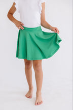 Kelly green Mila & Rose twirl skort for toddlers, featuring a playful, flared design with a comfortable elastic waistband.