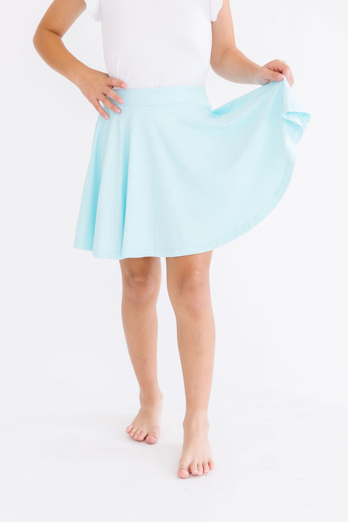 Aqua Mila & Rose Twirl Skort with a flowy, layered design and elastic waistband, perfect for casual wear or play.