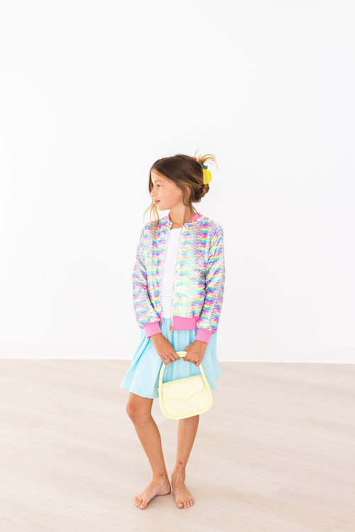Aqua Mila & Rose® Twirl Skort with a playful, flowy design, featuring a vibrant aqua color and comfortable elastic waistband.