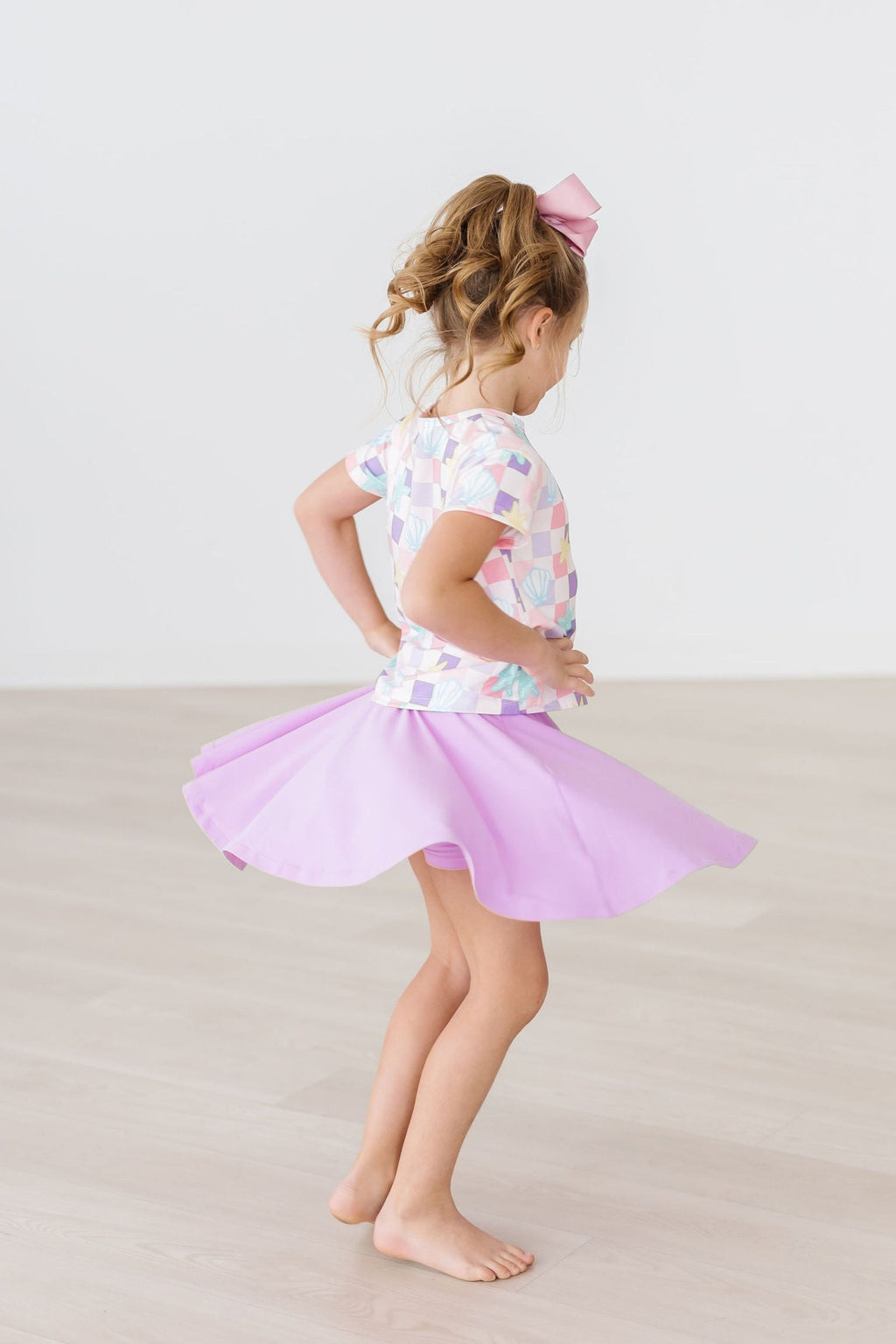 Bright lilac Mila & Rose twirl skort for girls aged 6-12 months, featuring a playful, flared design and comfortable fabric.
