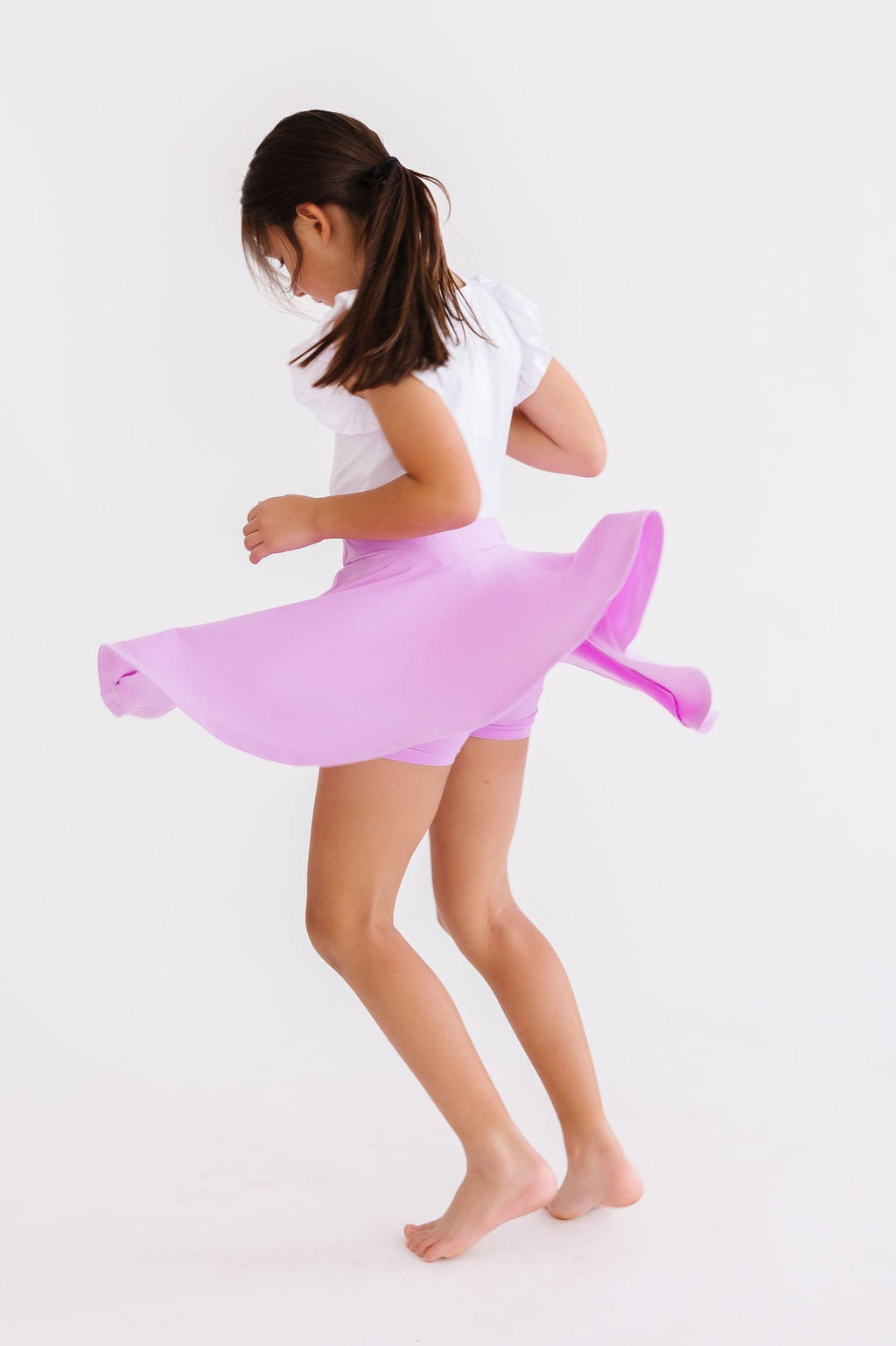 Bright lilac Mila & Rose twirl skort for girls aged 6-12 months, featuring a playful design and comfortable fabric.