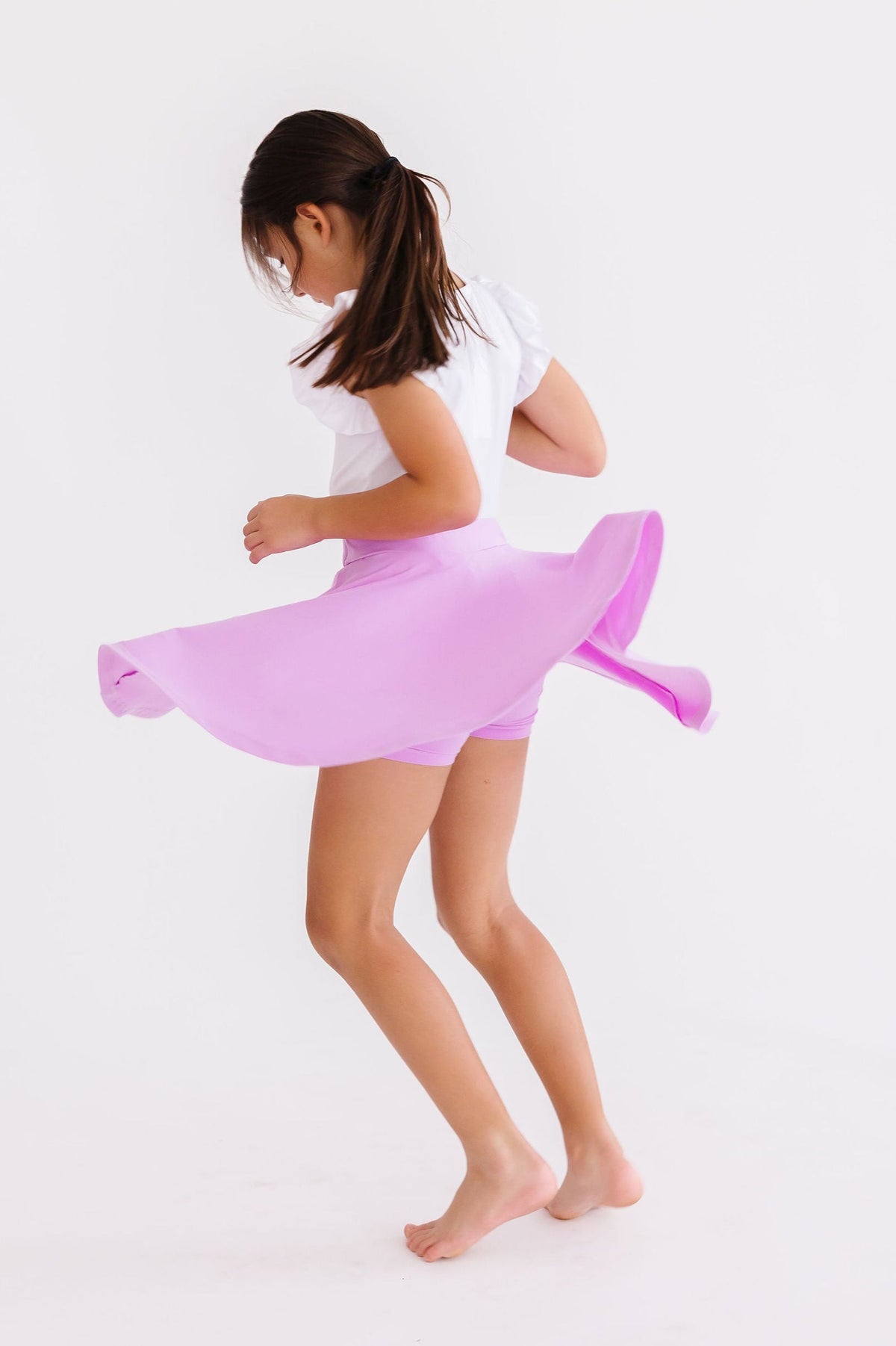 Bright lilac Mila & Rose twirl skort for girls aged 6-12 months, featuring a playful design and comfortable fabric.