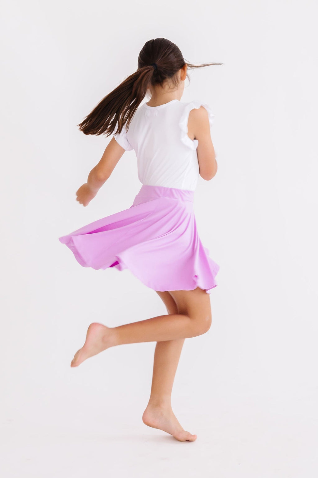 Bright lilac Mila & Rose twirl skort for girls age 6-12 months, featuring a playful, flowy design with elastic waistband.
