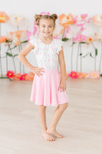 Bubblegum pink Mila & Rose twirl skort for 6-12 months, featuring a playful, flared design perfect for little girls.