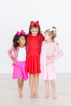 Bubblegum pink Mila & Rose twirl skort for 6-12 months, featuring a playful, ruffled design and comfortable fabric.