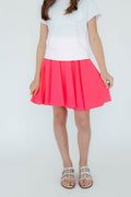 Neon pink Mila & Rose twirl skort for 6-12 months, with a playful swirl pattern and comfortable elastic waistband.