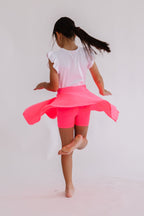 Neon pink Mila & Rose twirl skort for toddlers, with a playful flared design and comfortable elastic waistband.
