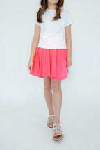 Neon pink Mila & Rose twirl skort for girls, soft fabric with a playful design, suitable for ages 6-12 months.