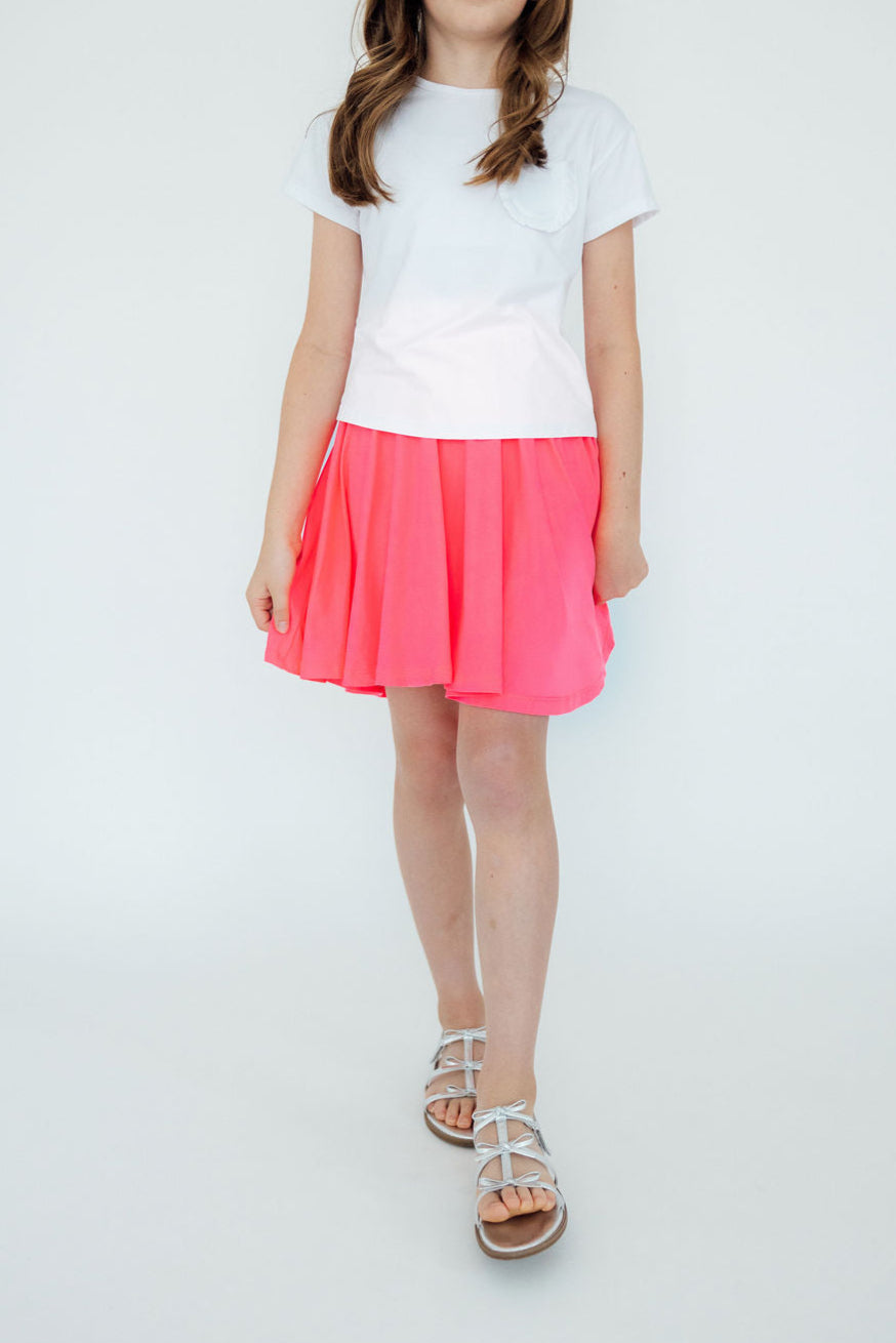 Neon pink Mila & Rose twirl skort for girls, soft fabric with a playful design, suitable for ages 6-12 months.