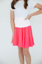 Neon pink Mila & Rose twirl skort for girls, soft fabric with a flared, playful design, ideal for casual wear and active play.