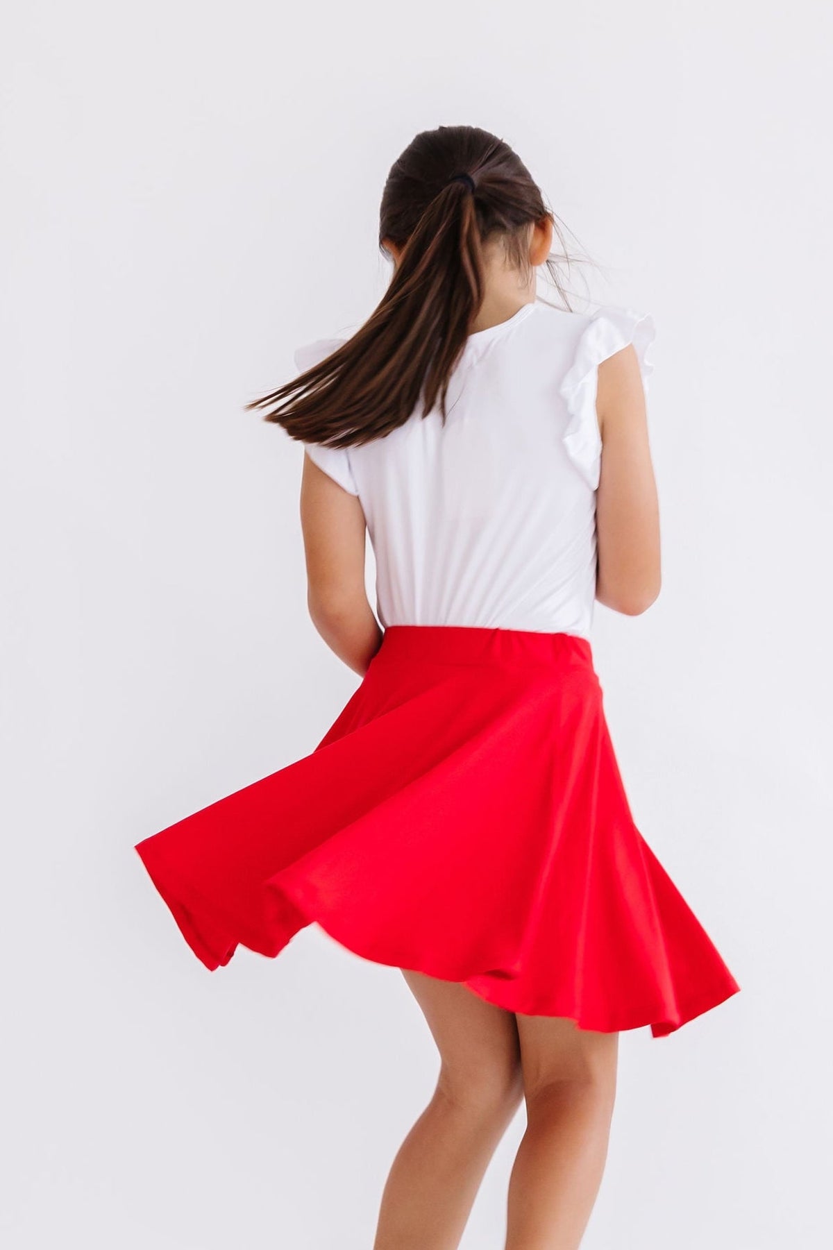 Red Mila & Rose twirl skort for girls in size 6-12 months, with a playful, twirling design and comfortable fabric.