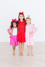 Red Mila & Rose twirl skort for 6-12 months, featuring a playful twirl design and comfortable fabric.