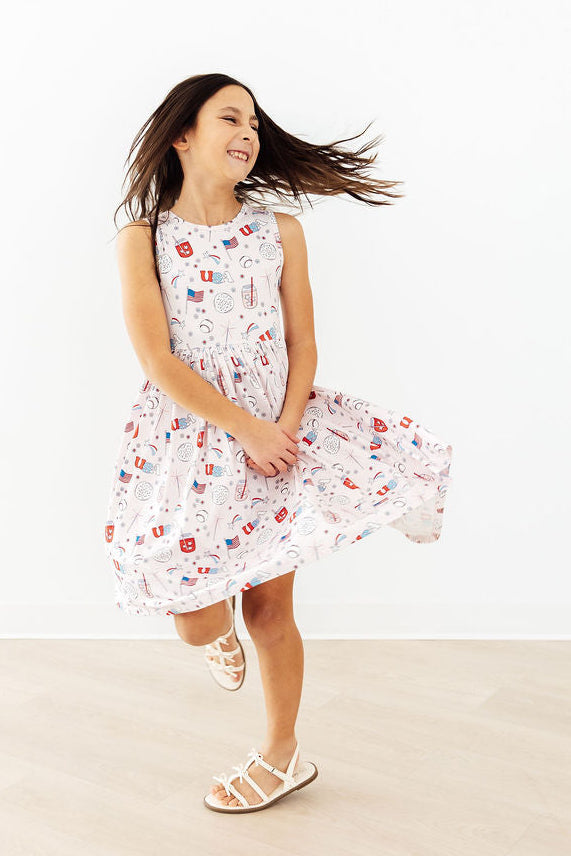 Mila & Rose ® Born in the USA twirl tank dress for babies, featuring a playful design and comfortable fit for 6-12 months.
