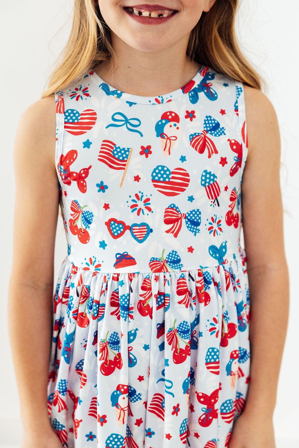 Little Miss Liberty Twirl Tank Dress by Mila & Rose for 6-12 months, featuring a playful design and comfortable fit.