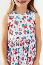 Little Miss Liberty Twirl Tank Dress by Mila & Rose for 6-12 months, featuring a playful design and comfortable fit.