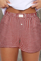 Red gingham printed high waist casual shorts by Mommas Hive, polyester bottoms with a relaxed fit and stylish design.