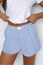 Red gingham printed high waist casual shorts from Mommas Hive, made of 100% polyester, shown on a model.