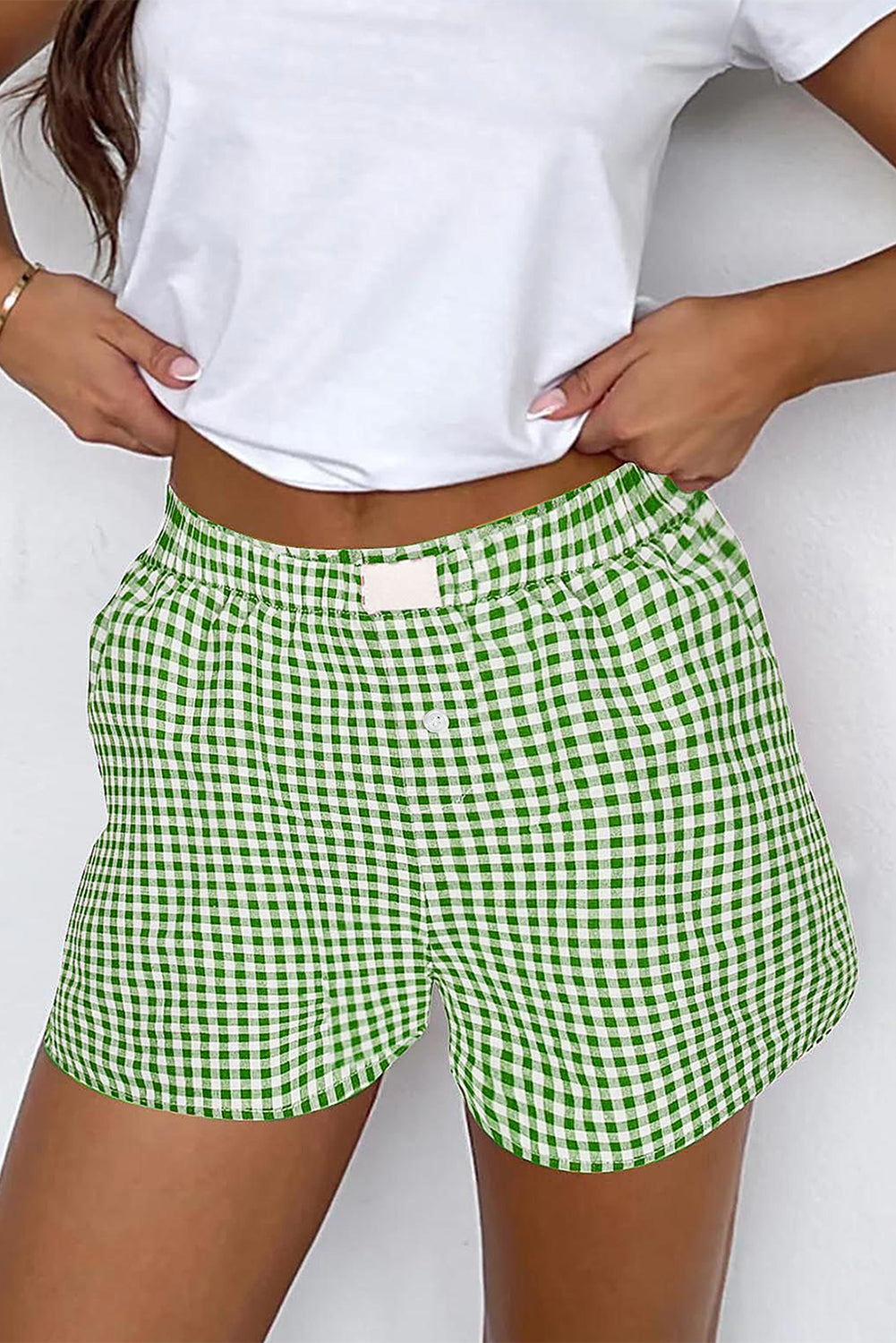 Red gingham printed high waist casual shorts by Mommas Hive, featuring a relaxed fit and front pockets.