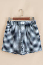 Red gingham printed high waist casual shorts for women, made of polyester, by Mommas Hive, shown laid flat with waistband visible.