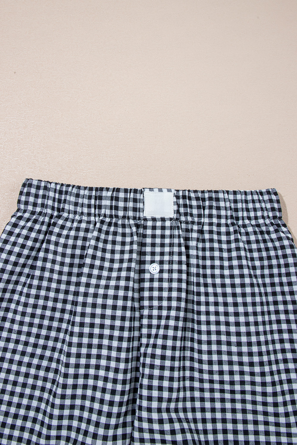 Red gingham printed high waist casual shorts by Mommas Hive, featuring a stylish fit and comfortable polyester fabric.