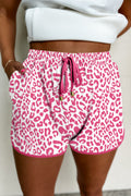 Pink leopard print casual shorts with elastic waist, lace-up front, and contrast trim from Mommas Hive.