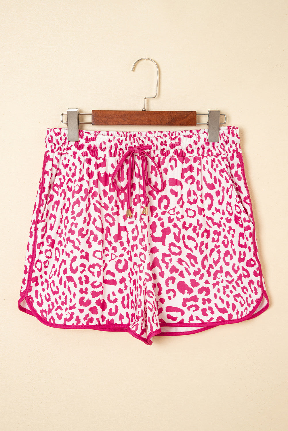Pink leopard print casual shorts with elastic waist, lace-up front, contrast trim, made by Mommas Hive.