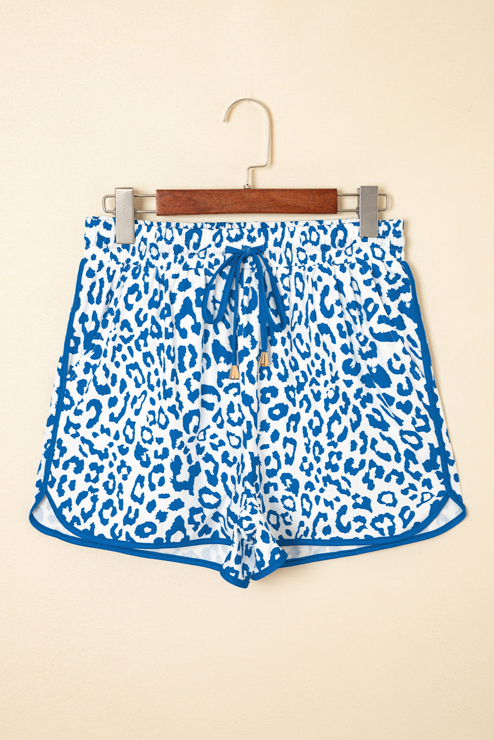 Pink leopard print casual shorts with elastic waist, lace-up front, and contrast trim, from Mommas Hive.