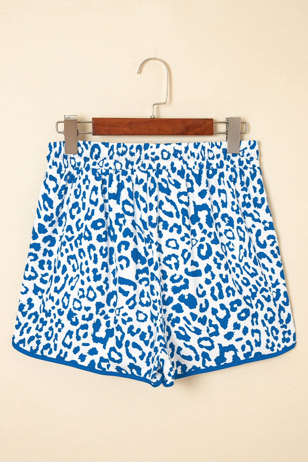 Pink leopard print casual shorts with elastic waist, lace-up detail, contrast trim, by Mommas Hive.
