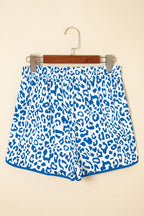 Pink leopard print casual shorts with elastic waist, lace-up detail, contrast trim, by Mommas Hive.