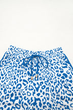 Pink leopard print casual shorts with elastic waist, lace-up front, contrast trim, made by Mommas Hive.